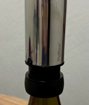 Bomba de vacío y tapón